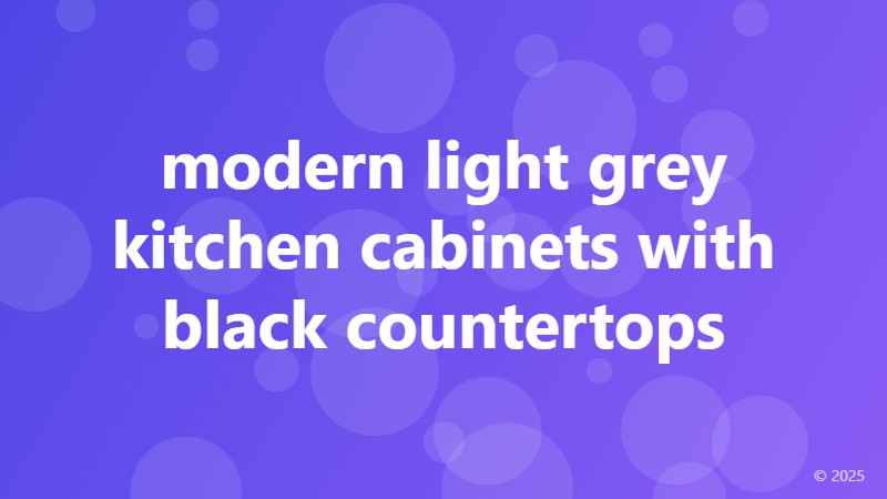 modern light grey kitchen cabinets with black countertops
